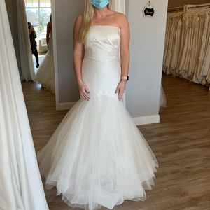 Size 12 wedding dress. No alterations , already bustled
